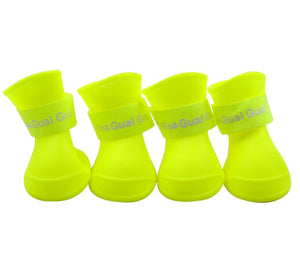 The pet dog boots with four silicone antiskid shoes wear waterproof dogs shoes candy colored pet rainy days appear essential